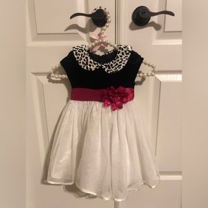 Beautiful black and cream 3T dress  with hot pink belt.